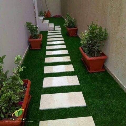 تنسيق حدائق تركيب العشب الصناعي تركيب الشلال زراعه التيل الطبيعي